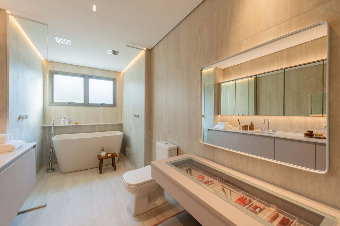 Banheiro 1 da suíte master do apartamento decorado de 268 m², Moná Mooca Residences